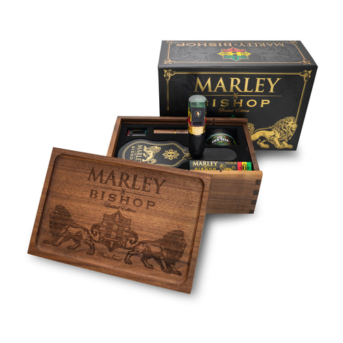 Marley x Bishop limited edition product packaging with gold lions and Rastafarian colors on a black background.