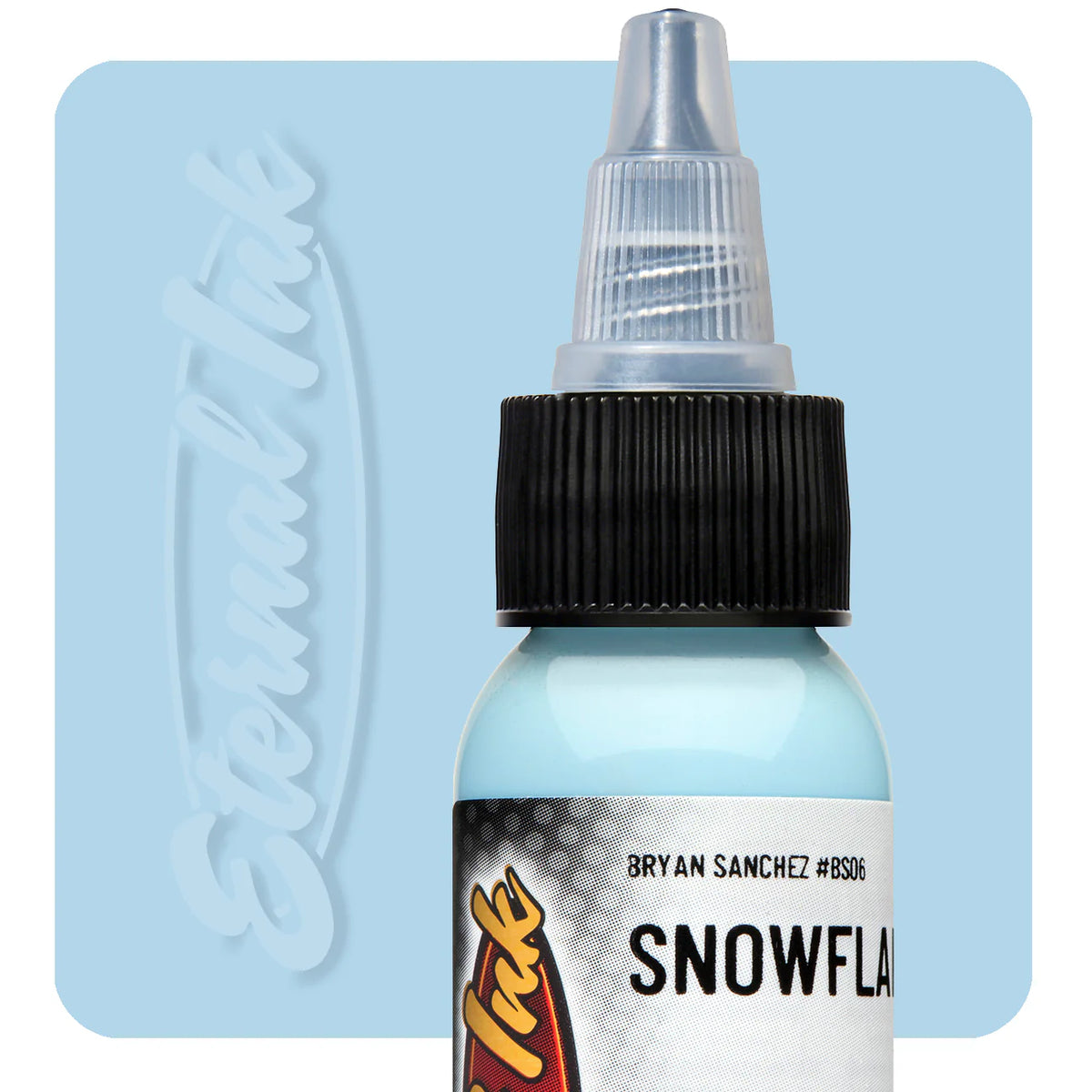 Bottle of tattoo ink with a black cap on a light blue background