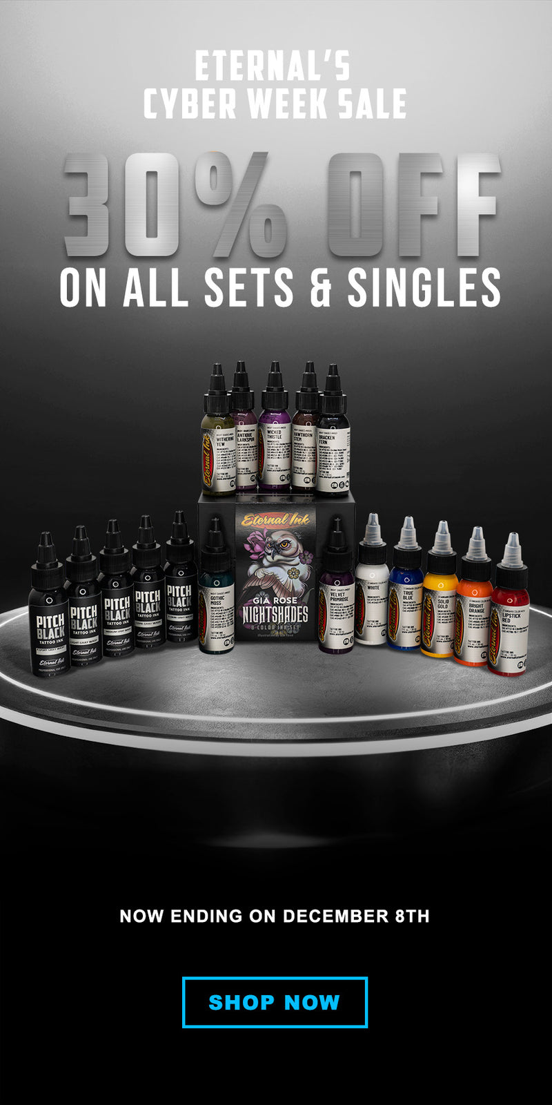 Promotional image for Eternal's Cyber Week Sale with a display of tattoo ink bottles and text about discounts.