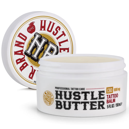 Hustle Butter tattoo balm jar with visible branding on a white background