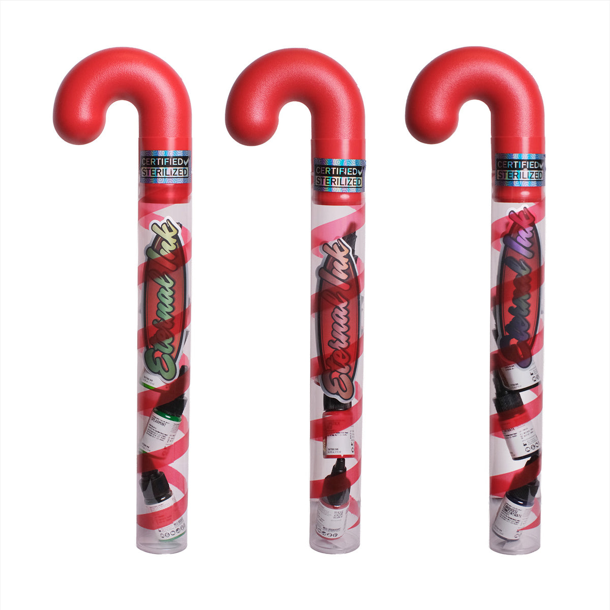 Three red candy canes with Eternal Ink on a white background