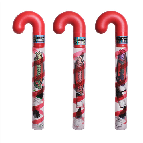 Red candy canes with festive design on a dark background with Christmas ornaments.