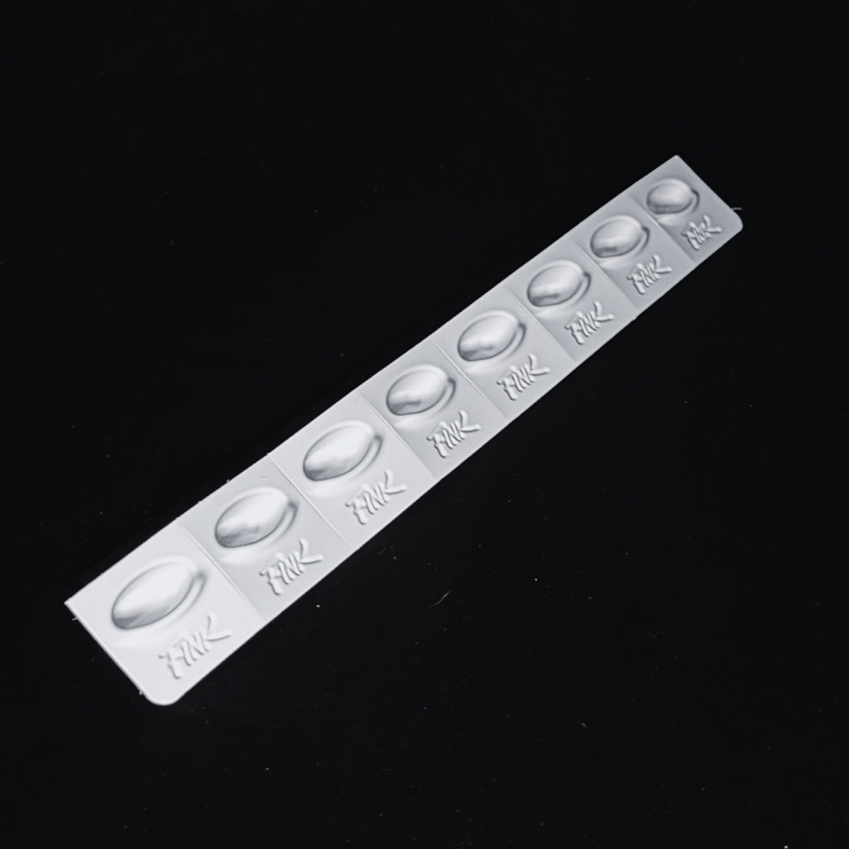 The Original FINK Cap™ Slanted Oval Tattoo Ink Caps